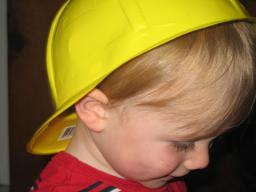 Sylvan wears his construction helmet