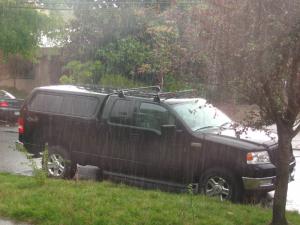 Neighbor’s truck, the “Glug Glug,” and lots o’ water