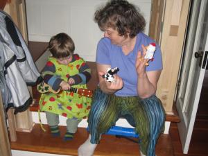 Sylvan and Gramma Mia, singing songs with puppets