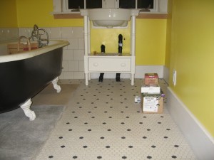 Yippee! A sink and a tub and baseboards.
