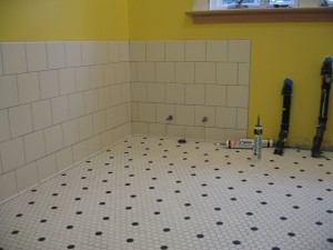 This morning. Chris tiled the floor in November, and Tony the Tiler did the tub surround last week.