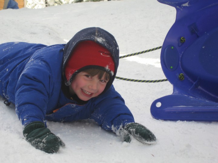 Sylvan after a pretty huge sledding wipe-out. He's always been happier outside.